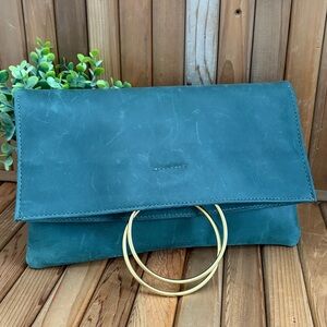 Parker Clay Leather Clutch • Gold Accent Handles